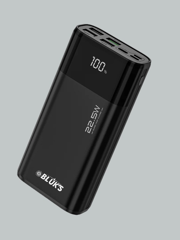 Black BX-305 20000mAh power bank showing digital LED display and multiple charging ports.