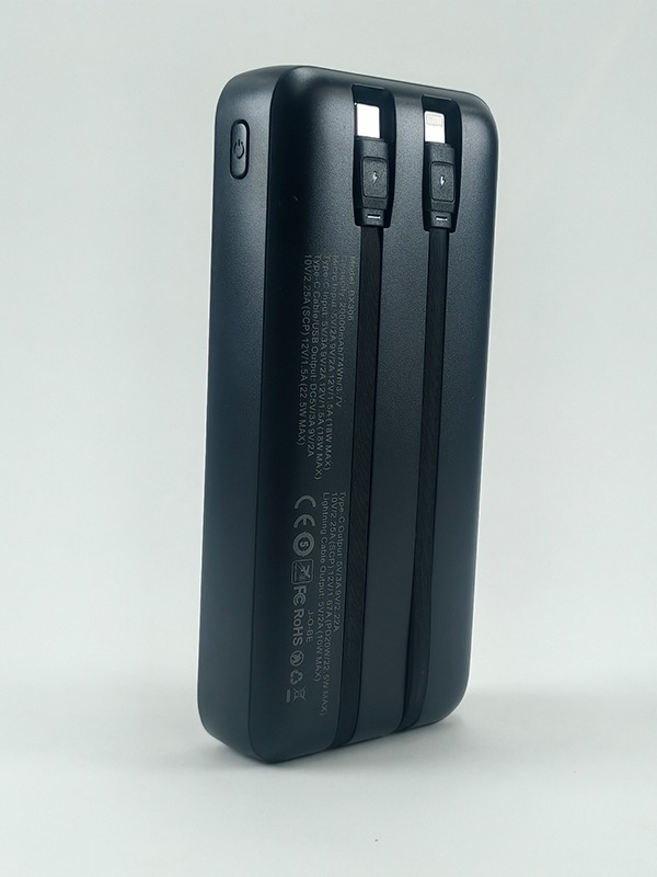 Slim white BX-306 20000mAh power bank showing multiple ports and a compact, portable design.